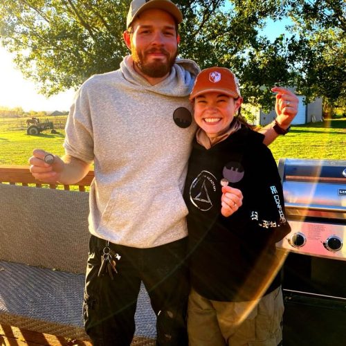 Jacob Little and Natalee Weidner owners of Warrior Monk Academy LLC holding up their Turbo Pins from Gabe White Pistol Shooting Solutions becoming better concealed carry instructors